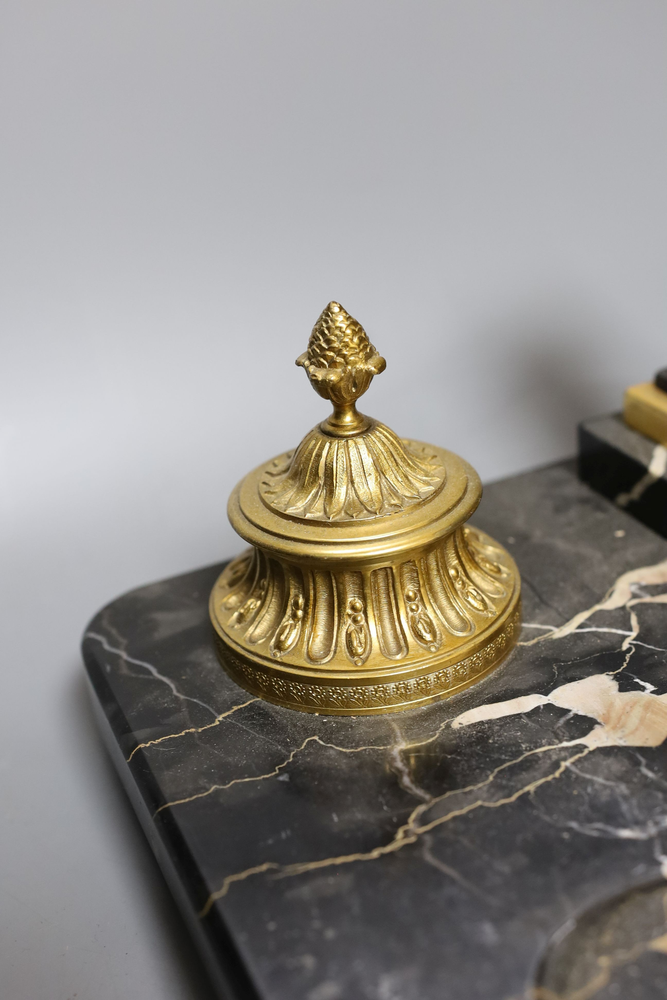 A bronze and marble ‘mercury’ inkstand, 40cm wide